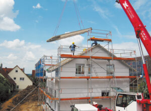 Building permit approvals inch up in...